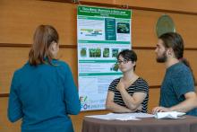 Student presenting research to other students